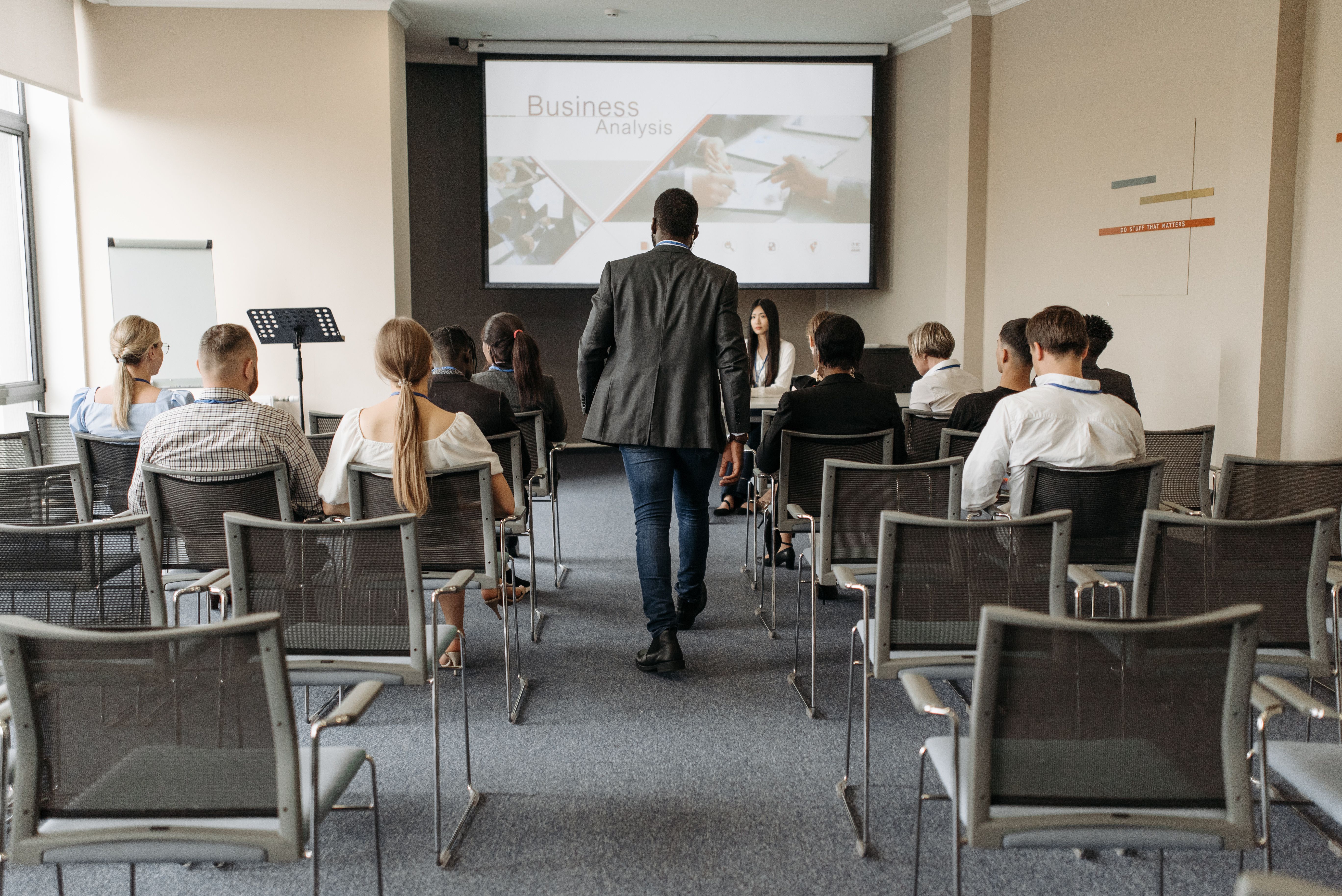 Professionals attending a business analysis and capacity-building session